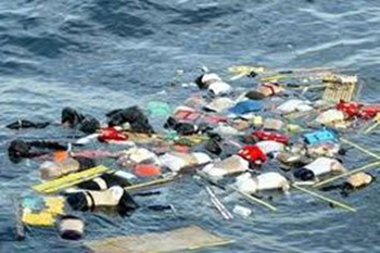 A photo shows dead bodies and debris floating on the sea.