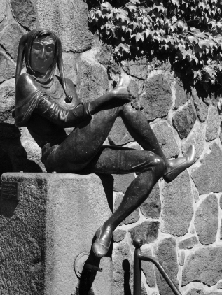Statue of the German trickster Till Eulenspiegel in Mölln, Germany